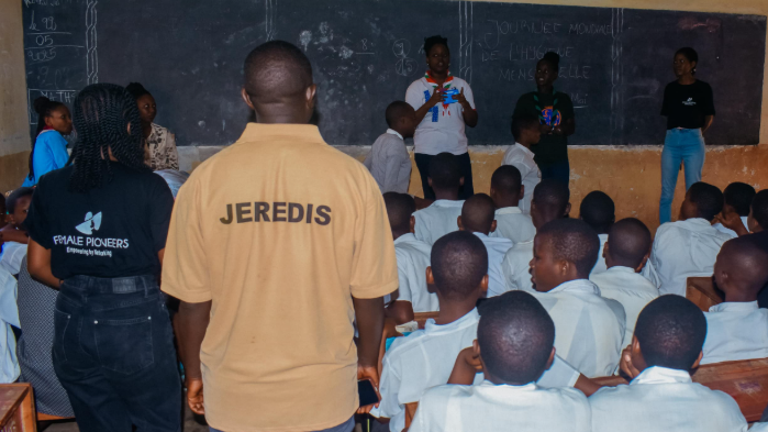 Young leaders in a circle discussion during training